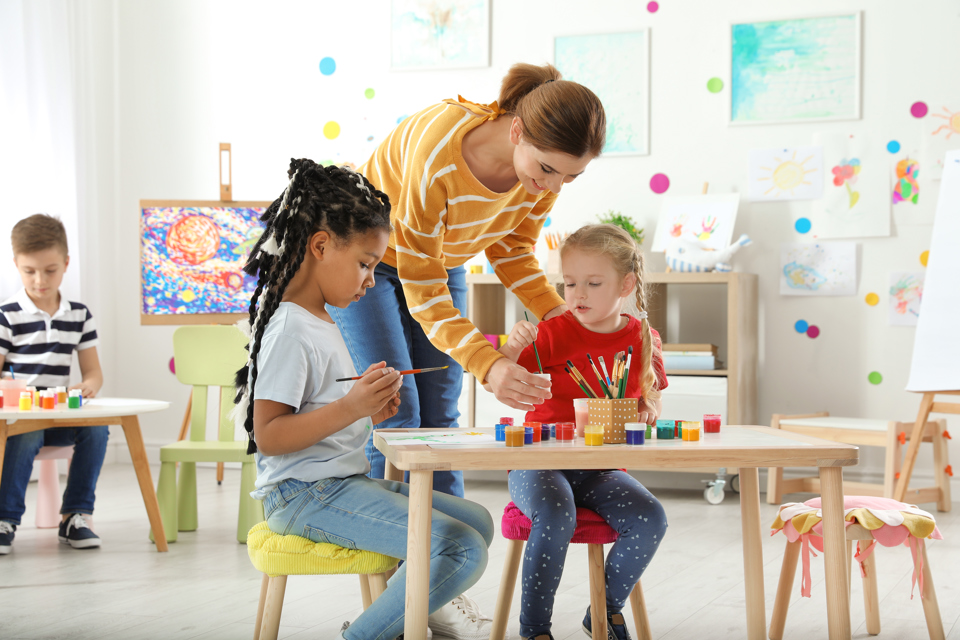children-and-teacher-painting-in-art-class-2026-03-27-01-52-18-utc.jpg