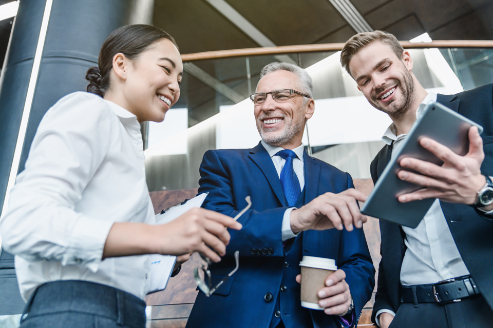 low-angle-view-of-group-successful-business-people-2026-03-16-22-56-51-utc.jpg