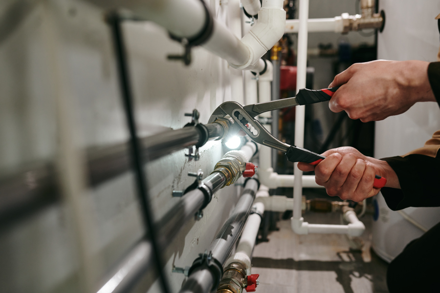plumber-repairing-pipes-in-industrial-setting-2026-03-24-00-31-17-utc.jpg