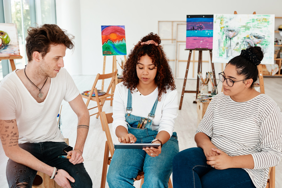 artists-reviewing-artwork-on-tablet-in-studio-2026-01-09-09-24-33-utc.jpg