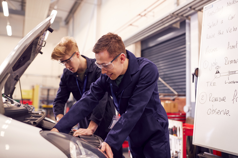 two-male-students-studying-for-auto-mechanic-appre-2026-03-10-04-49-30-utc.jpg
